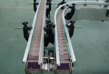 解析链板输送机在工业生产中广泛应用